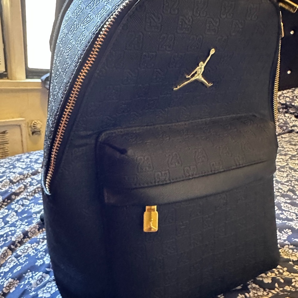 Jordan Black Embossed Backpack with Gold Accents